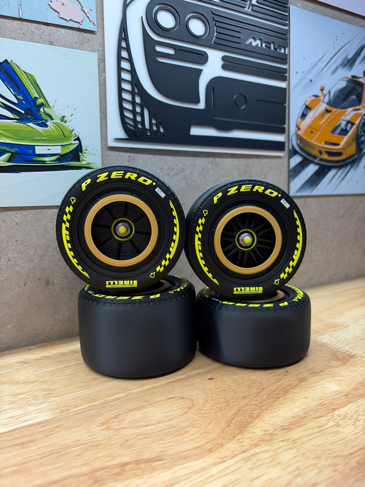 2026 Ferrari F1 Schumacher Monza Tribute 3D-printed wheels for 1:8 scale models, featuring yellow P Zero tyre markings, black spokes and distinctive gold wheel rims.